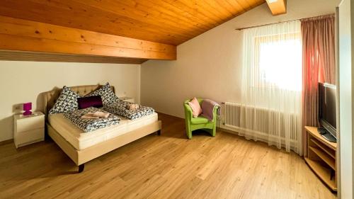 Ένα ή περισσότερα κρεβάτια σε δωμάτιο στο Waldchalet Steinbock
