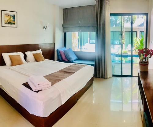 Postel nebo postele na pokoji v ubytování Diana Pool Access Phuket