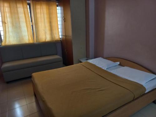 Кровать или кровати в номере Hotel Yatrik