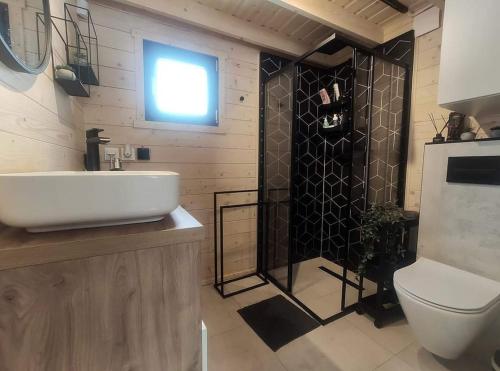 Ванна кімната в Domek Nasze Miejsce