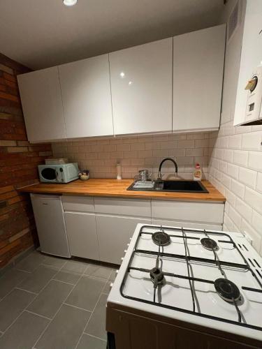 Dapur atau dapur kecil di Apartament Arverso
