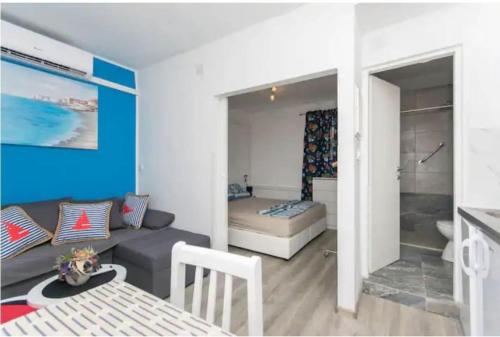 Ένα ή περισσότερα κρεβάτια σε δωμάτιο στο Dubrovnik cute little corner apartment