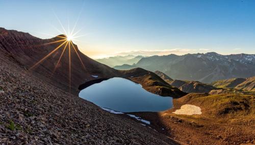 a view of a mountain with a lake on top at Haus Brigitta in Tux