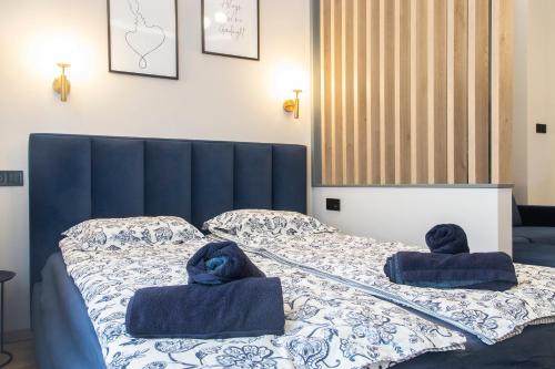 Posteľ alebo postele v izbe v ubytovaní Basilica Dream Apartment