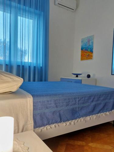 Кровать или кровати в номере Villa Musella B&B