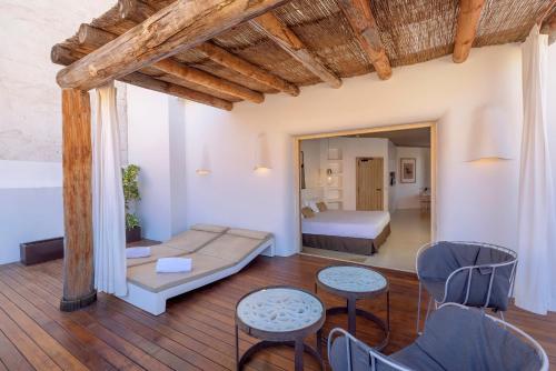 a living room with a bed and a bedroom at HM Balanguera in Palma de Mallorca