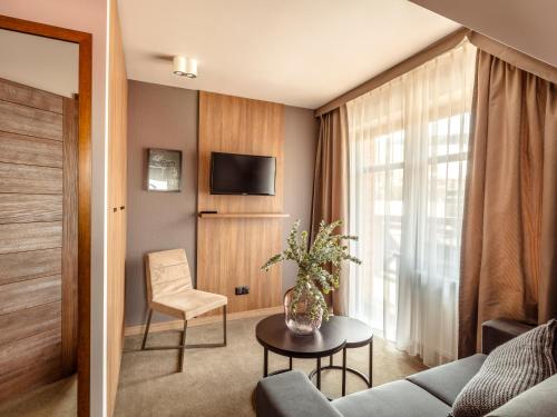 TV a/nebo společenská místnost v ubytování Villa Cam In Ski