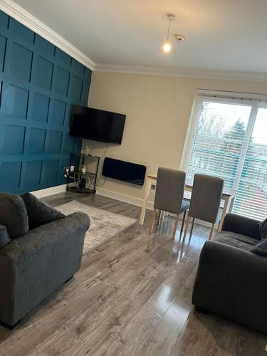 Μια τηλεόραση ή/και κέντρο ψυχαγωγίας στο Foyle View Apartment
