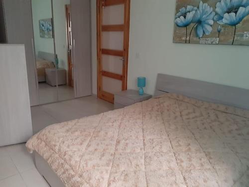 Postel nebo postele na pokoji v ubytování Lovely two bedroom apartment