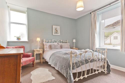 Postel nebo postele na pokoji v ubytování Vine Tree Cottage Coniston