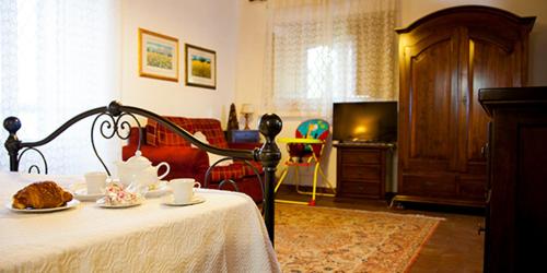Postel nebo postele na pokoji v ubytování Agriturismo Le Case Di Civi