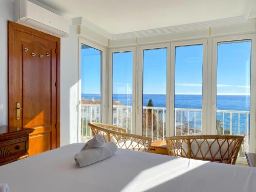 Postel nebo postele na pokoji v ubytování Delfin 3º3 Seaview Casasol