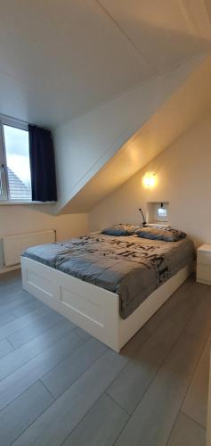 Katil atau katil-katil dalam bilik di Appartement Uniekappart