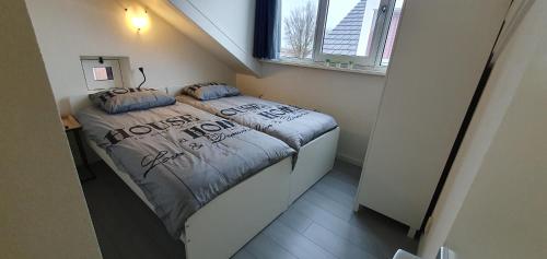 Katil atau katil-katil dalam bilik di Appartement Uniekappart