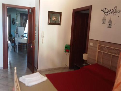 a view of a room with a bedroom and a living room at B&B Il Girasole in Assemini