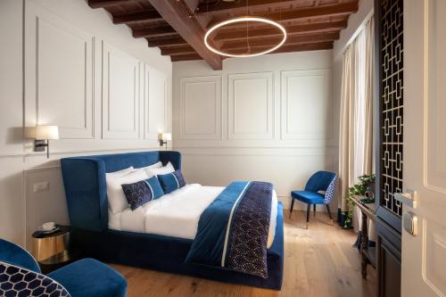 A bed or beds in a room at Garden Palace