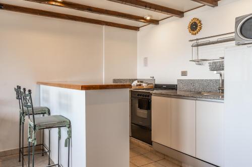 Nhà bếp/bếp nhỏ tại Utaka Cabañas y Apartamentos