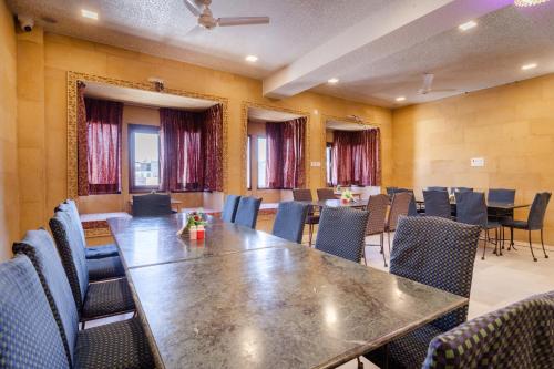 a conference room with a large table and chairs at Hotel Akashdeep - Located City Centre in Jaisalmer