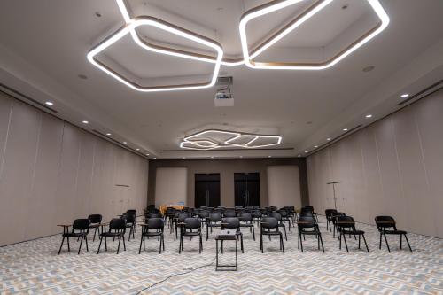 a conference room with a bunch of chairs in it at Lara Barut Collection-Ultra All Inclusive in Lara