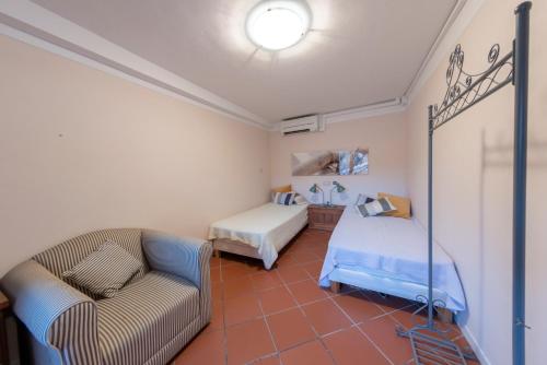 Кровать или кровати в номере Casa del Geco - La natura intorno a te