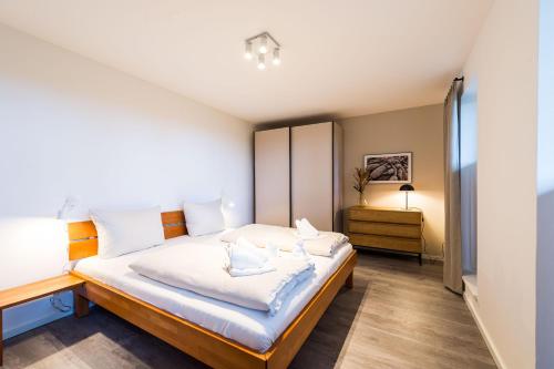 Postel nebo postele na pokoji v ubytování Ferienappartement Boye71 Ferienappartement Boye71