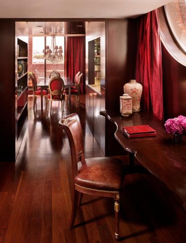 a dining room with a table and some chairs at Faena Hotel Buenos Aires in Buenos Aires