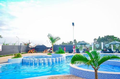 Бассейн в Fahari Homes - 2 Bedroom Apartment in Tatu City, Nairobi или поблизости