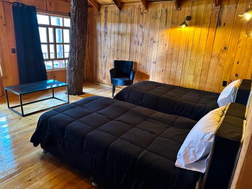 Postel nebo postele na pokoji v ubytování PINE TREE Mazamitla Hotel Boutique & Cabañas