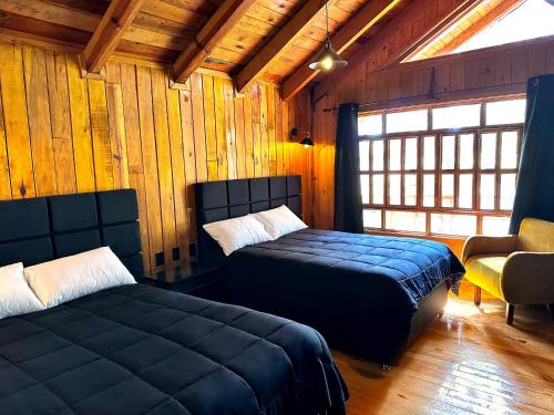 Postel nebo postele na pokoji v ubytování PINE TREE Mazamitla Hotel Boutique & Cabañas