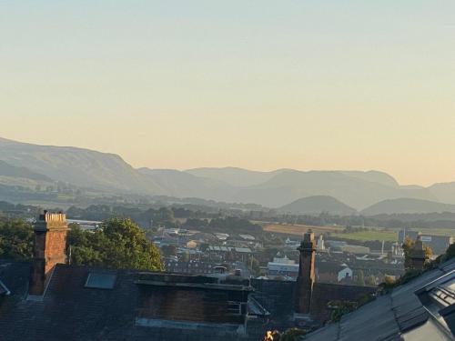 a view of a city with mountains in the background at North View B&B in Penrith