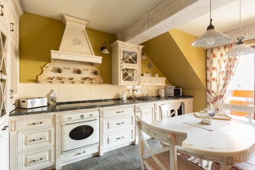 Køkken eller tekøkken på Apartament SWEET HOME