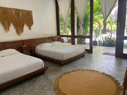 Ένα ή περισσότερα κρεβάτια σε δωμάτιο στο Hanan Pacha