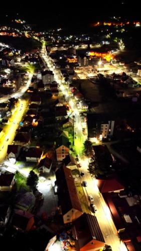 an overhead view of a city at night at Modern Mountain in Kolašin