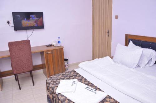 Akure Airport Hotelにあるベッド