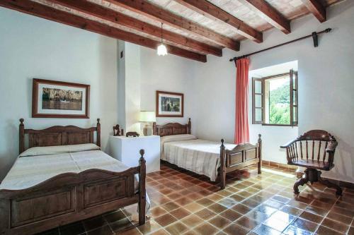 Postel nebo postele na pokoji v ubytování Villa Guillo