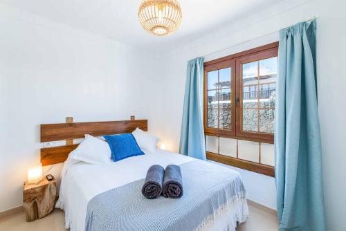 A bed or beds in a room at Villa Samui