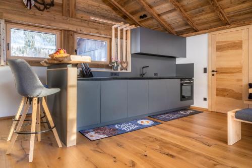a kitchen with a sink and a counter top at Chalet Schintlbauer in Annaberg im Lammertal