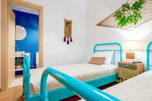 A bed or beds in a room at Villa Thalassa Skaleta