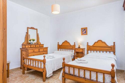 Postel nebo postele na pokoji v ubytování Villa Yesero