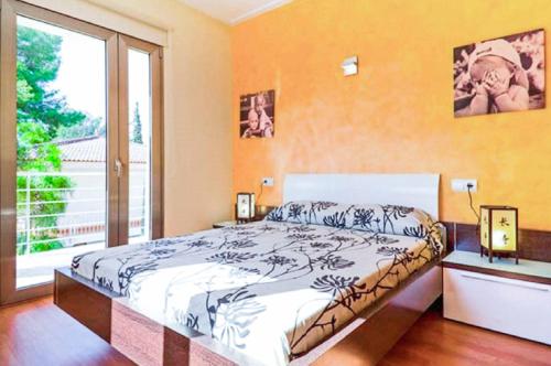 Ένα ή περισσότερα κρεβάτια σε δωμάτιο στο Villa Albufera