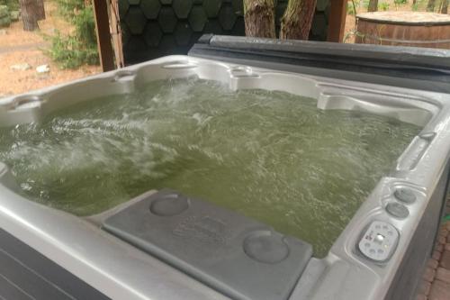a bath tub filled with water in a stove at .... chillout między Łodzią a Warszawą in Nieborów