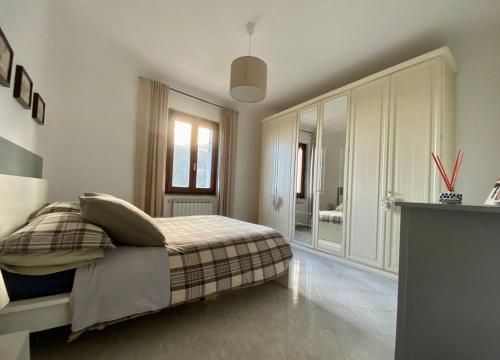 Ένα ή περισσότερα κρεβάτια σε δωμάτιο στο Sunrise apartament
