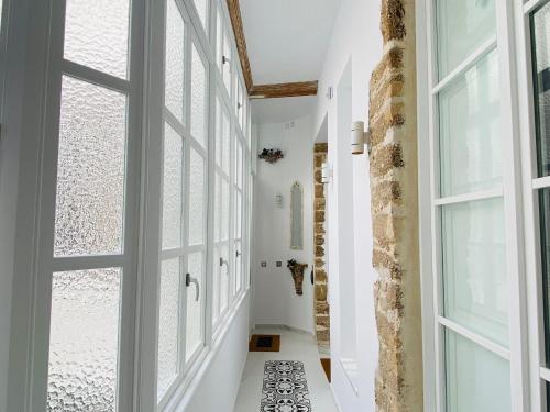 Ένα μπάνιο στο inncadizcasa Señorial de Rivadavia