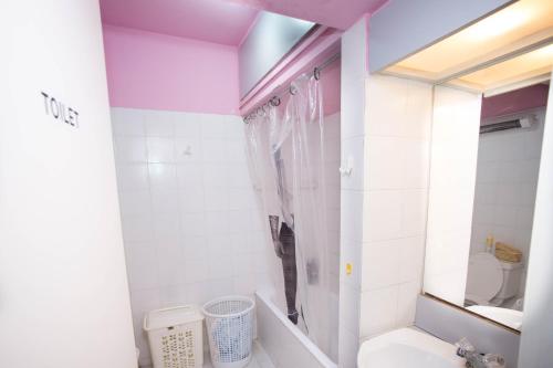 a bathroom with a shower and a toilet at private room in a shared flat at best location in Limassol