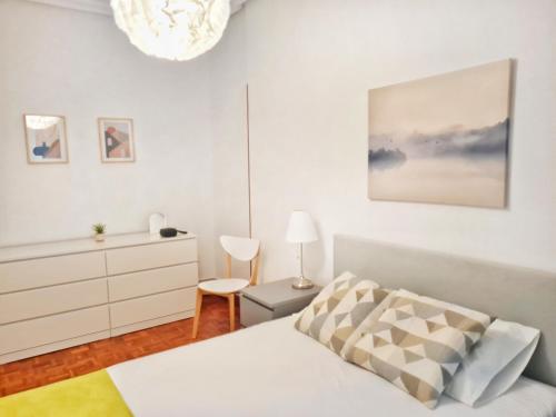 Posteľ alebo postele v izbe v ubytovaní Apartamento Urbieta by SanSe Holidays - Center