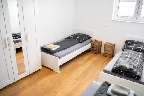 Ένα ή περισσότερα κρεβάτια σε δωμάτιο στο 140m² Wohnung / 3 Schlafzimmer