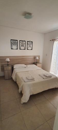 Postel nebo postele na pokoji v ubytování Valle de Uco Departamentos Urbanos - Ruta 40