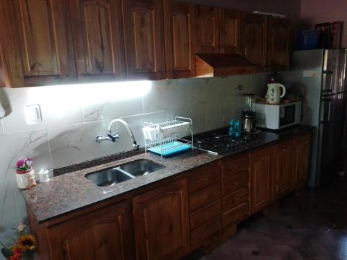 Η κουζίνα ή μικρή κουζίνα στο Nuestro Hogar