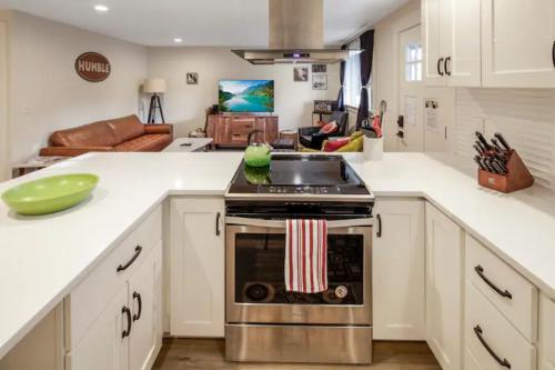 a kitchen with a stove top oven in a kitchen at VogueTown in Boise