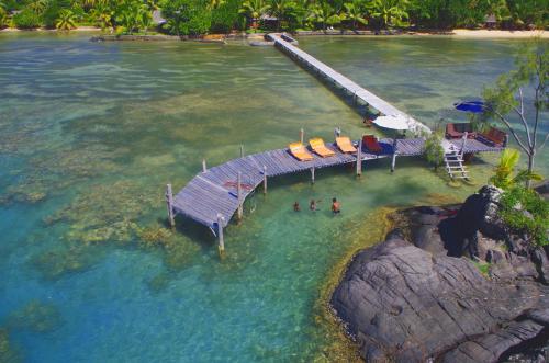 an aerial view of a dock in a body of water at Libertalia Hotel in Sainte Marie